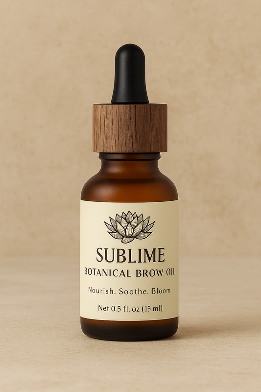 Bottle of Sublime Botanical Brow Oil with wooden dropper on a beige background